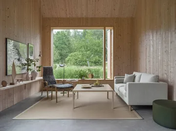 Lamino fåtölj och fotpall oljad ek/fårskinn - Scandinavian Grey (grå) - Swedese